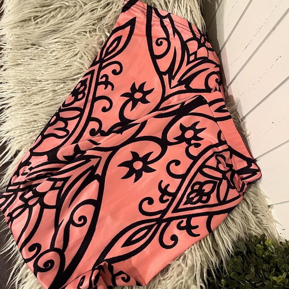 Coral and black silky flare dress pants